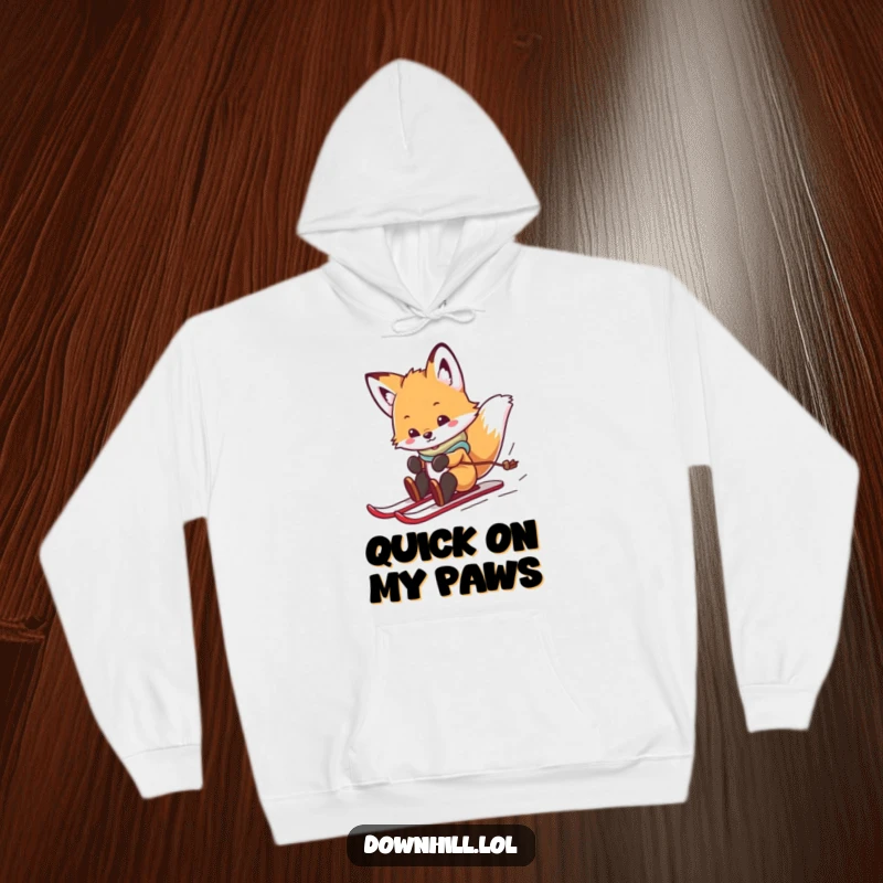 A cozy hoodie featuring a funny, playful fox cub in skis, spinning and sliding down a winter slope with infectious joy.