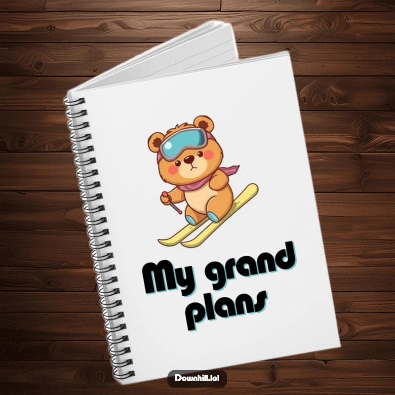Funny, determined bear cub on a notebook cover, wearing skis and descending bravely but clumsily, perfect for jotting notes.